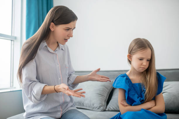 istock Mother and daughter ahving a conflict and looking stressed 1342714872