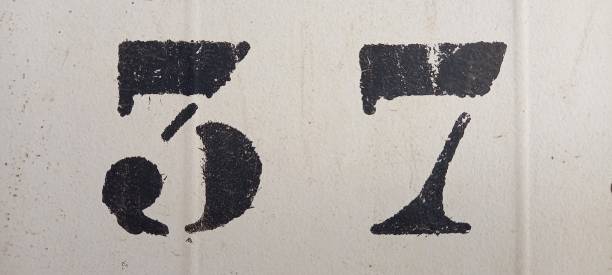 istock number thirty-seven painted stencil on white backdrop, number thirty-seven, number 37 1342734154