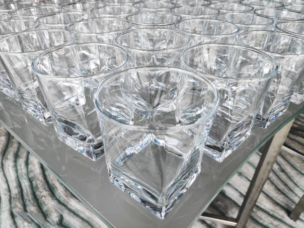 istock Lots of empty, clean glasses on the table. Background, texture. 1342739615