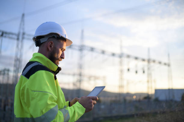 istock Electictical Engineer Usung Digital Tablet In Power Station 1342758966