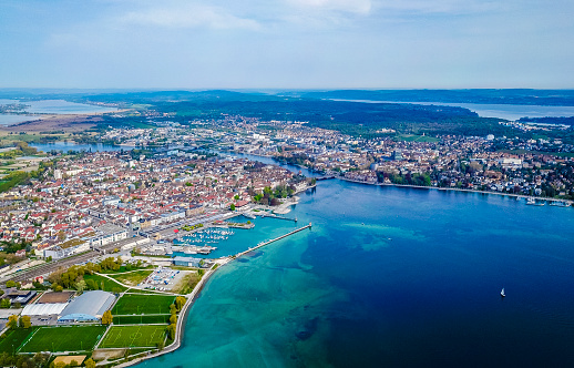 Lake Constance Bodensee landscape panorama from the Seeburgpark in Kreuzlingen Canton Thurgau Switzerland with drone panorama view to city Constance in Germany.
