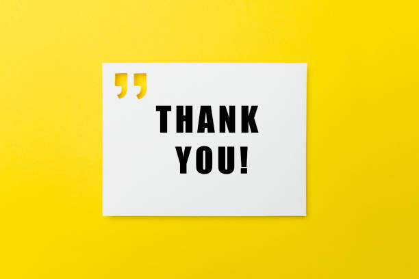 Thank You White card with quotation mark where Thank you is written on yellow background. admiration photos stock pictures, royalty-free photos & images