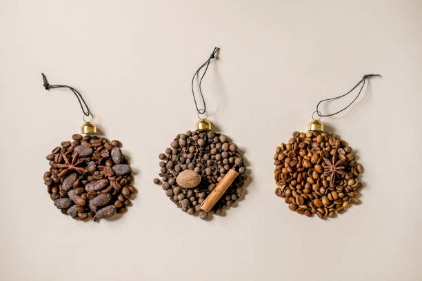 istock Aromatic spices collection and different coffee beans as Christmas balls 1342784805