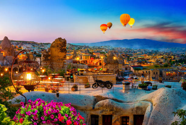 Balloons at sunrise in Turkey Goreme town on sunset in Cappadocia, Central Anatolia,Turkey cappadocia photos stock pictures, royalty-free photos & images