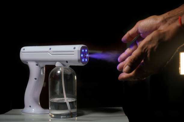 istock automatic alcohol dispense, concept protect disease virus against germs and clean in the public area. 1342804992