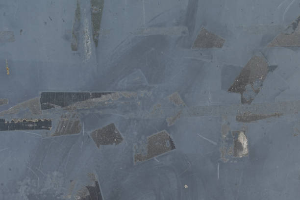 istock weathered metal surface with peeled adhesive tape stains 1342806313