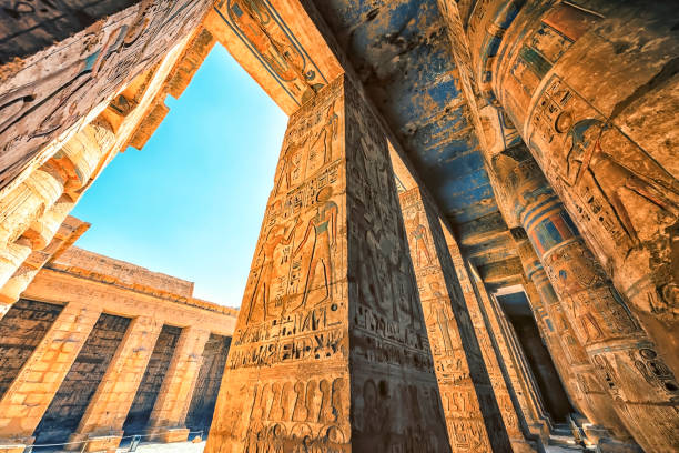 Habu Temple in Luxor The Temple of Ramesses III in Luxor, Egypt luxor thebes stock pictures, royalty-free photos & images