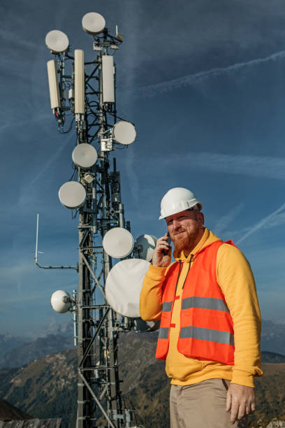 istock A male engineer utility infrastructure worker at a telecom tower mountain site 1342806630