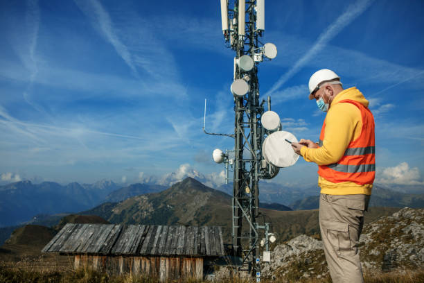 istock A male engineer utility infrastructure worker wearing ppe at a telecom tower mountain site 1342807524