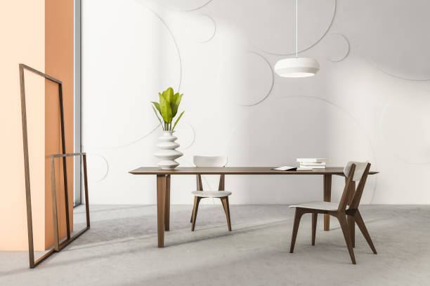 istock Living room interior with wooden table, two chairs and frames 1342807761