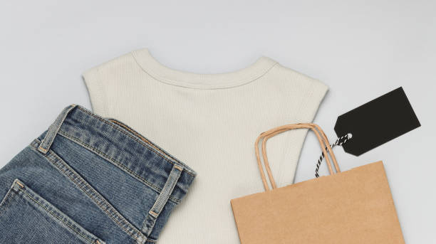 istock Clothes with shopping bag and empty black price tag 1342809326