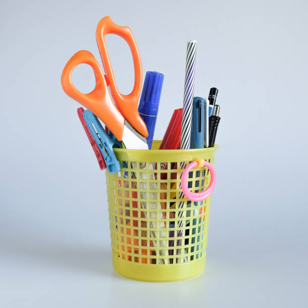 istock Set of stationery items in basket on background. 1342809403