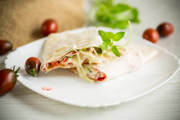 istock baked pita roll with filling in a plate on the table 1342811150