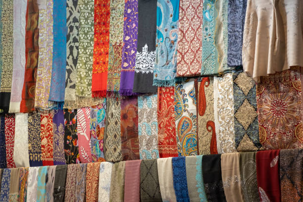 istock fabrics lined up in a shop window 1342817434