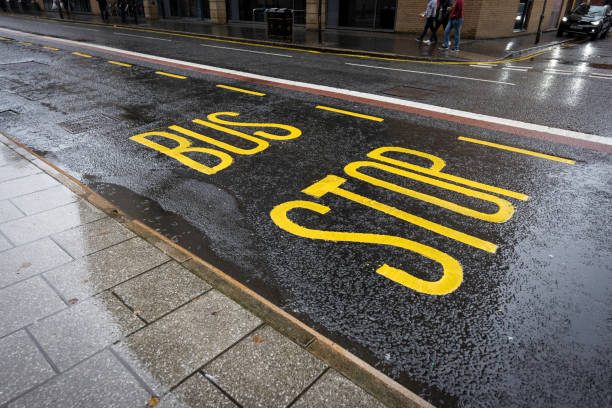 Bus stop road marking stock photo