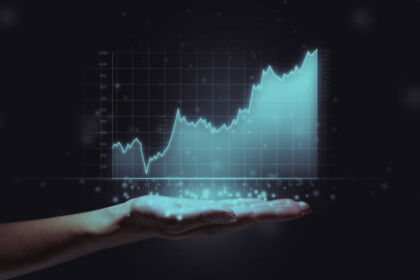 istock Business growth concept with graphic graph above person hand. 1342838392