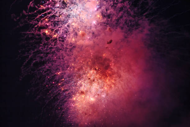 istock Holiday fireworks backgrounds with sparks, colored stars and bright 1342849575