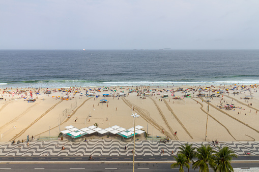 Leme Beach in Copacabana, Rio de Janeiro, Brazil - September 18, 2021: Full beach after the relaxation of the covid19 pandemic in the city of Rio de Janeiro.
