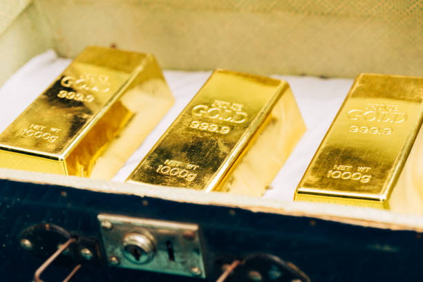istock great bars of gold lying in an old suitcase 1342851005