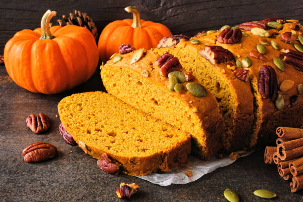 istock Autumn pumpkin bread close up atable scene 1342854312