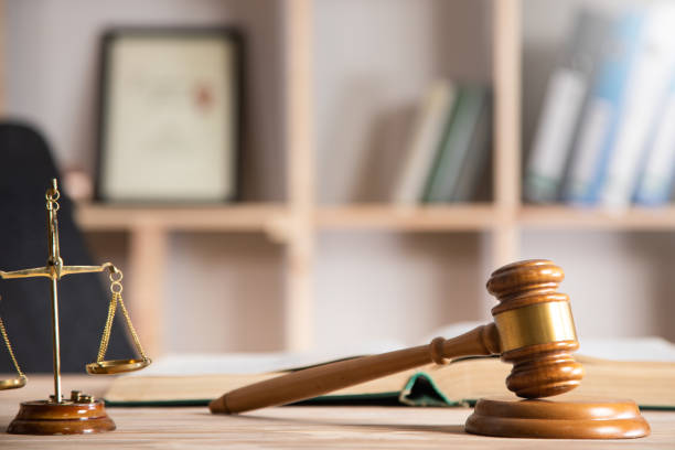 istock scales with judge gavel and law book 1342854912