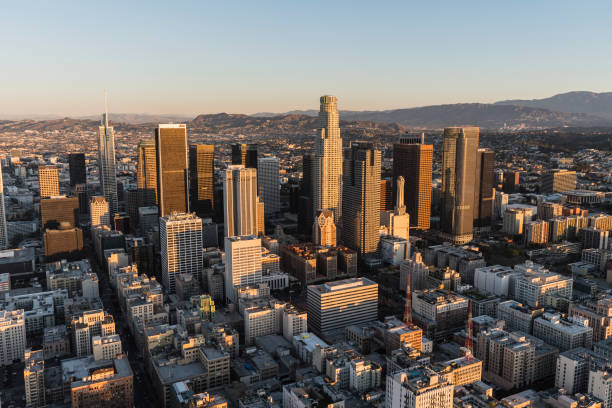Los Angeles Downtown Towers Early Morning Aerial Los Angeles, California, USA - February 20, 2018:  Early morning aerial view of towers, streets and buildings in the urban core of downtown LA. city of los angeles stock pictures, royalty-free photos & images