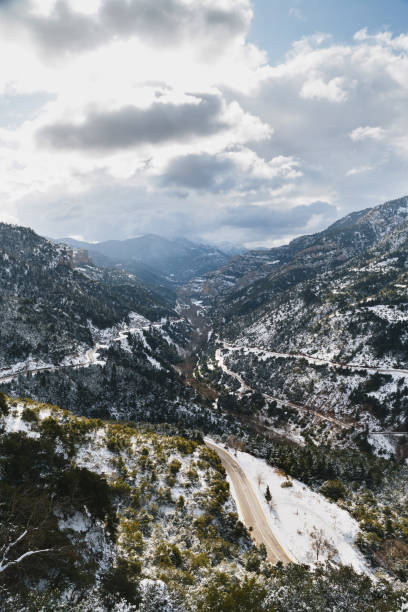 aerial view at vouraikos gorge with diakopto-kalavryta rack railway running down through canyon. top view from mega spileon monastery. popular winter travel destination in kalavryta, greece, europe - rack railway imagens e fotografias de stock