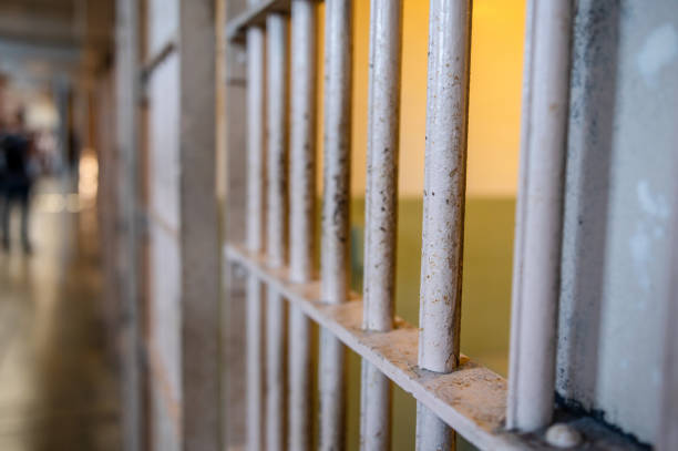 bars of a cell in the prison - prison stockfoto's en -beelden