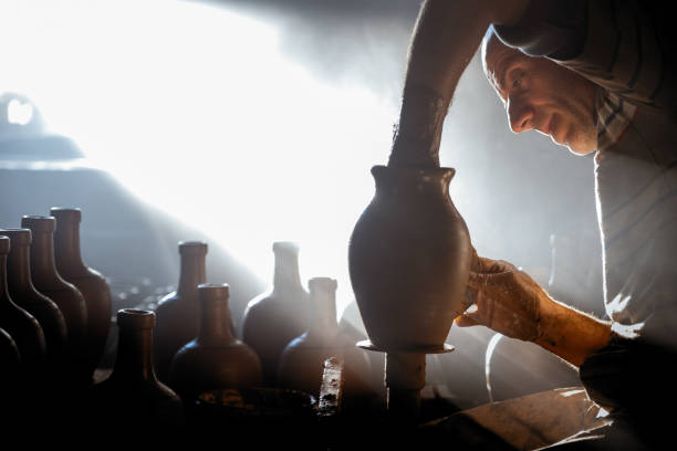 istock master who makes the clay pot with traditional methods 1342881847