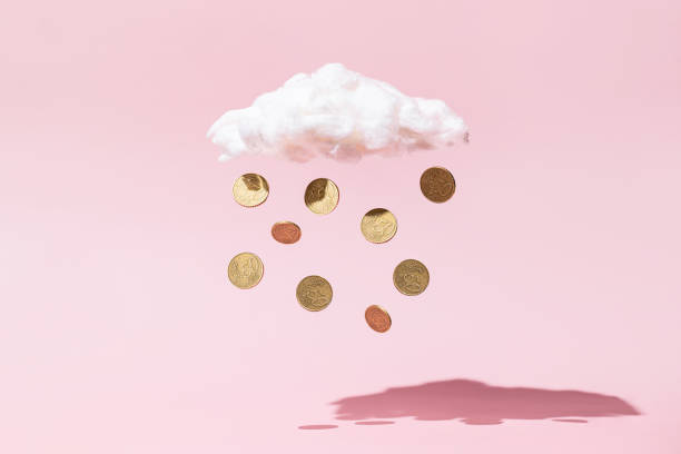 money rain concept made of gold coins and white cloud on pink background - price drop imagens e fotografias de stock