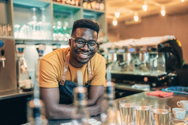 istock Portrait of happy bartender 1342916791