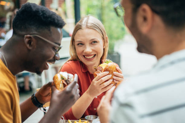 istock Friends and fast food 1342916799