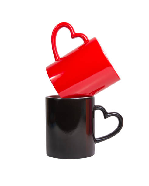 istock Red and black heart cup ceramic isolated on the white background 1342930316
