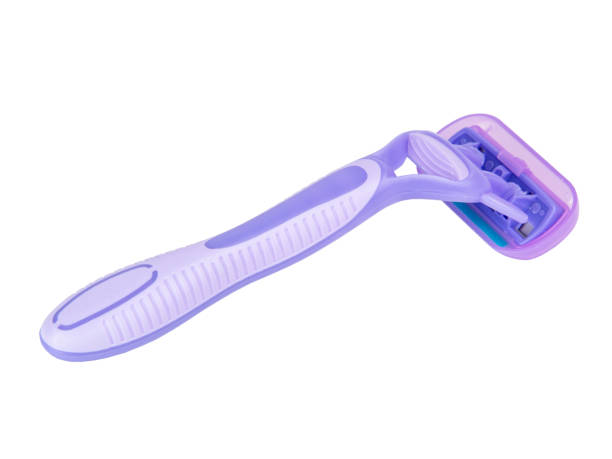istock Violet razor for shaving isolated on the white background 1342930480