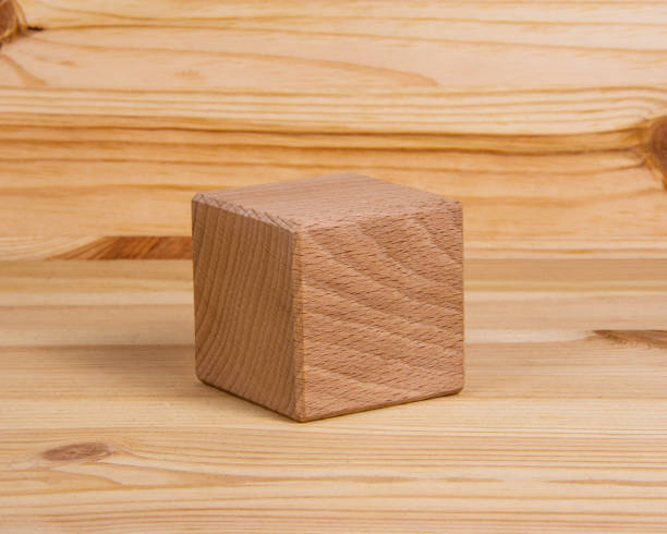 istock One wooden cube square on wood vintage background copyspace 1342935537