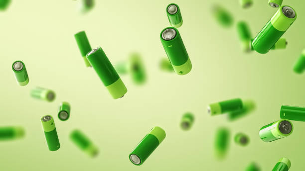istock Multiple falling green batteries with depth of field. Green energy concept. 1342947060
