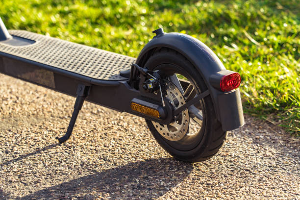 istock Electric scooter or e-scooter transportation in rural setting in summer sunshine 1342949885