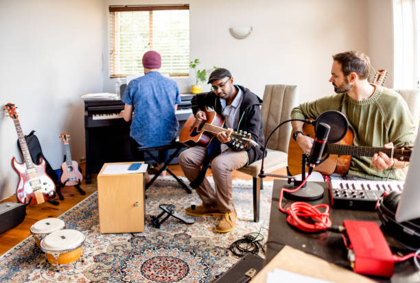 istock Diverse young musicians playing different instruments during a rehearsal 1342953488