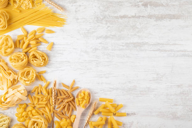 Different Types of Italian Pasta on Rustic Wooden Table