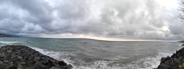 istock Panoramic wavy gloomy sea photo 1342956736