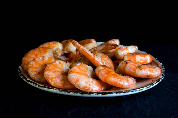 istock Fried Argentine shrimps on a dark background 1342959210