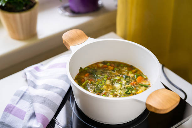istock Large pot with vegetable soup minestrone 1342962751