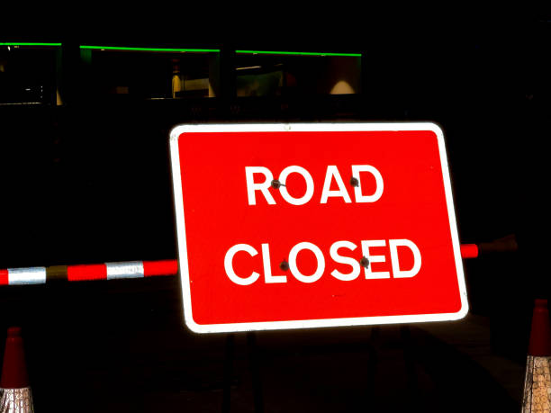 istock Highly reflective roadworks sign at night 1342964560