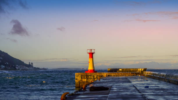 istock Colorful Kalk bay harbor lighthouse in cape town 1342975351