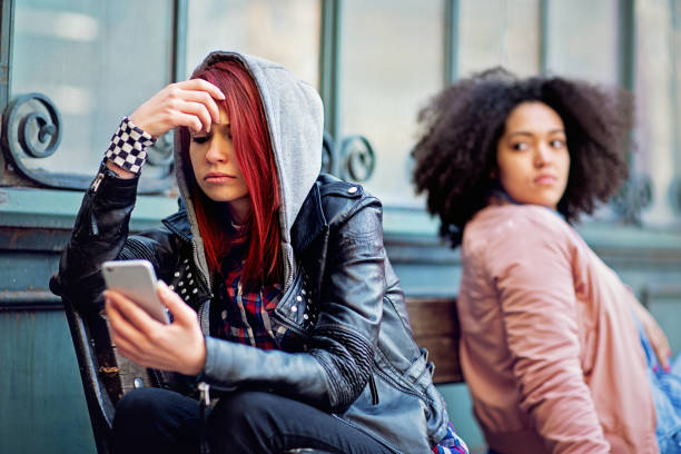 istock Girlfriends in conflict are sulking each other 1342975538