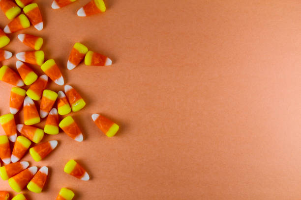 istock Colorful Halloween candy corn background banner 1342979517