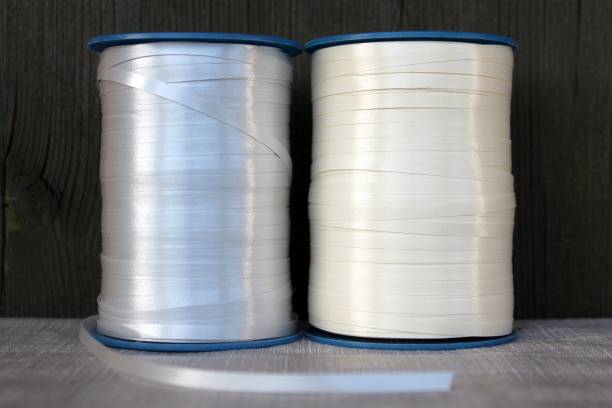 istock Gift ribbons in silver and cream 1342980147