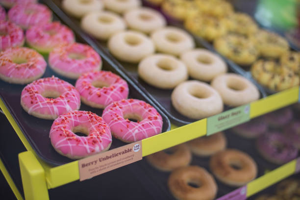 istock Various colourful Donuts For Sale In Shop 1342980379