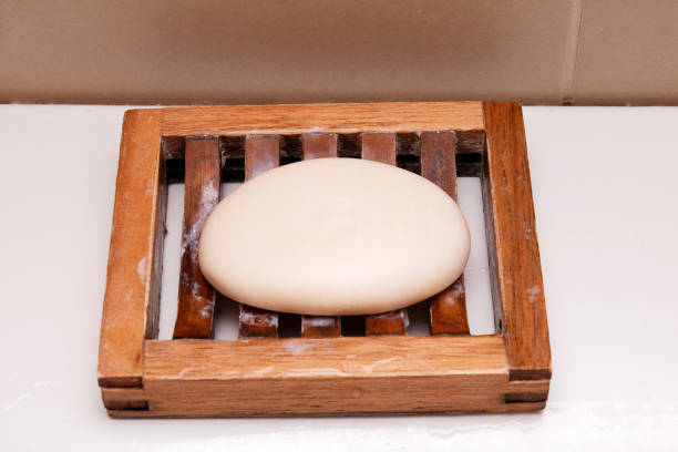 Soap on wooden tray in bathroom stock photo