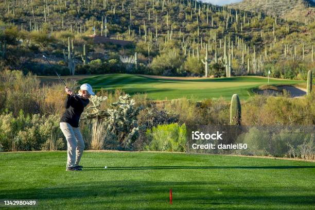 Retired Woman Playing Golf In Tucson Arizona Stock Photo - Download Image Now - Tucson, Golf, Arizona